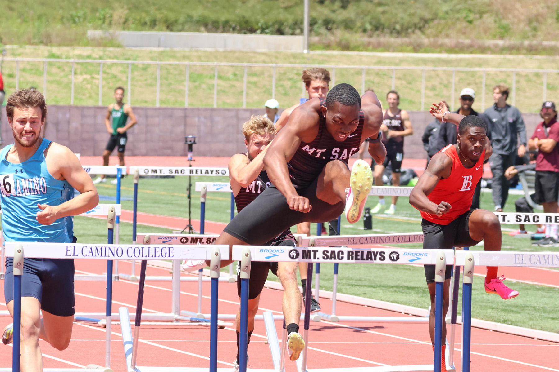 Mt. SAC's Christian Baker wins the 110 hurdles (photo by Richard Quinton).