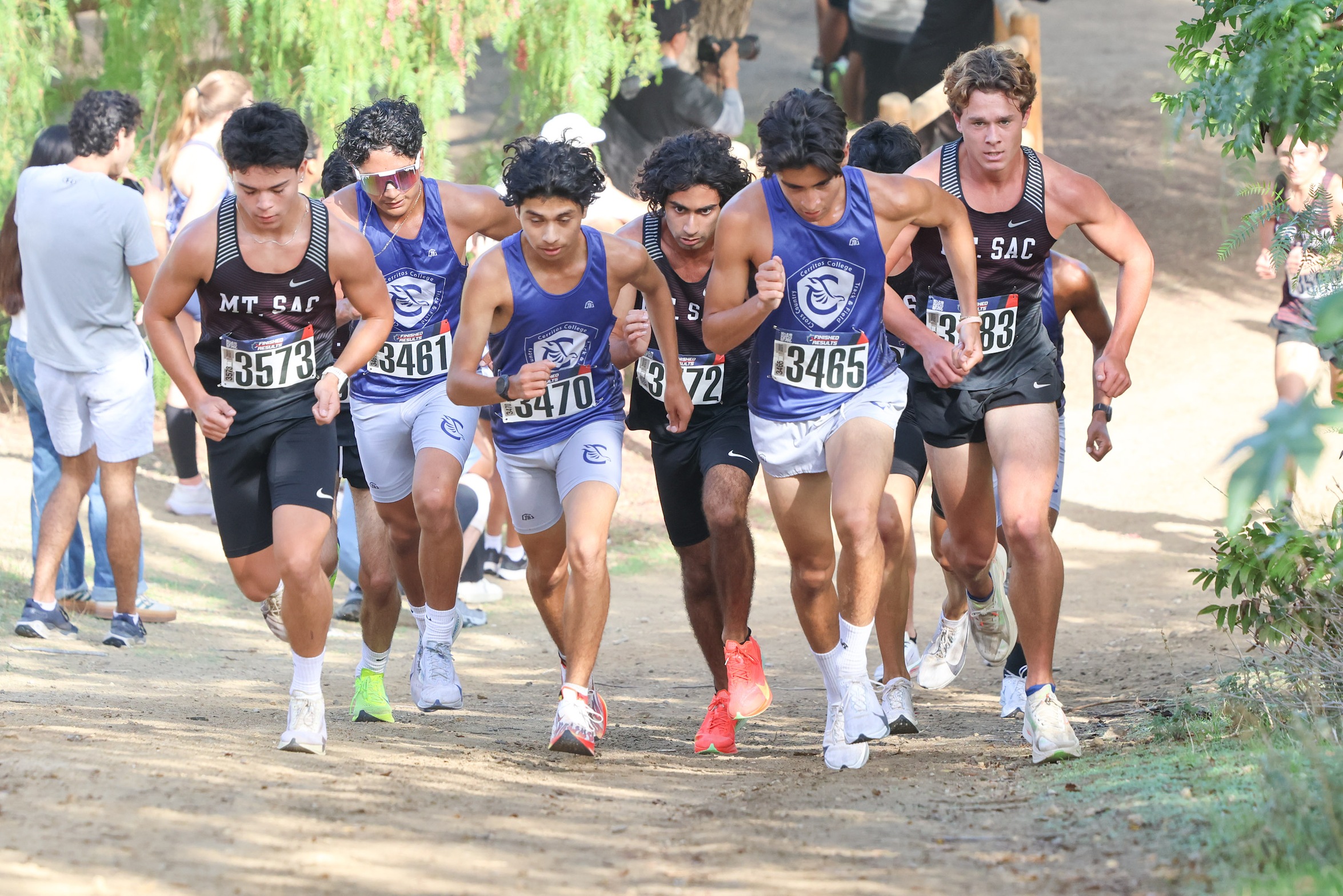 Jonah Botello (middle hidden between two blue jerseys) helped Mt. SAC win its 12th straight SCC men's cross country title (photo by Richard Quinton).