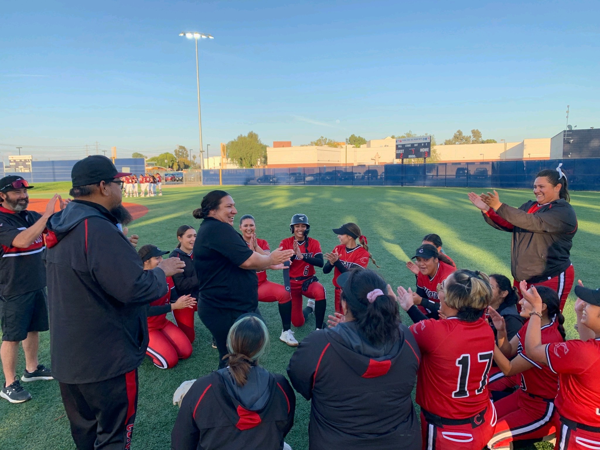 Compton College and Coach Victoria Castillo celebrates after its historic win.